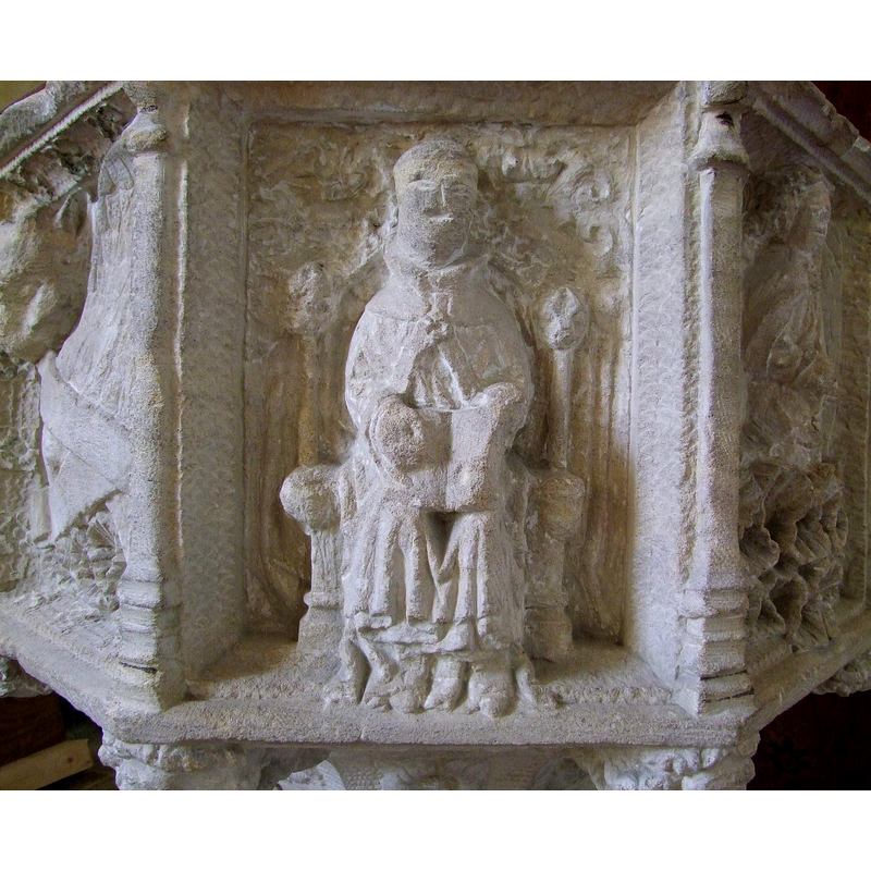 in the central panel; in the left panel is Luke's symbol; in the right panel is Matthew's angel [cf. Font notes]