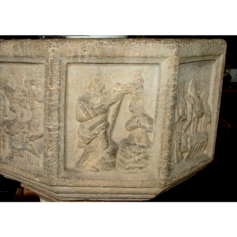 on the left panel is the cacrament of Baptism; note the representation of the Jordan waters in the centre panel, almost like a barrel-shaped font; on the right panel is the Extreme Unction