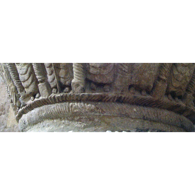the carving is not precise, but may have been intended as a braid -- photographed after the 2008 restoration