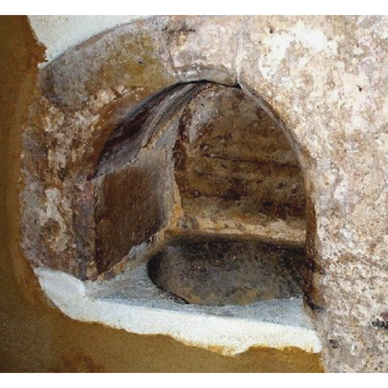 wall-mounted stoup near the blocked south door