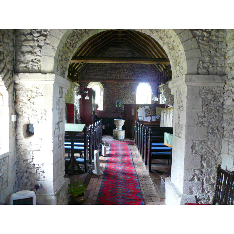 the font at the west end of the nave