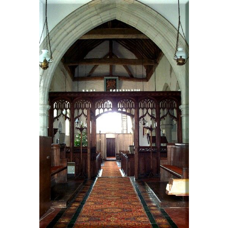 the font partially visible at the back, in the bank of pews of the north (right) side