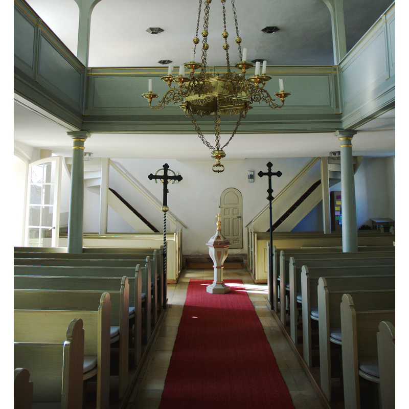 the modern font and cover in the centre aisle of the main nave of the Evangelische Marienkirche Großhaslach