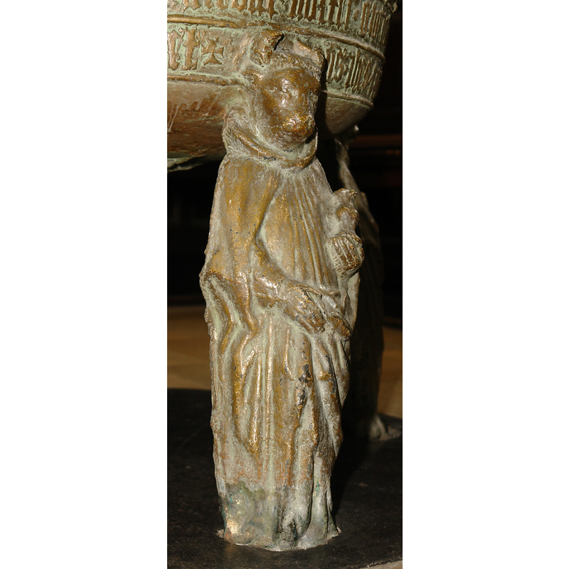 a standing cleric with an ox's head