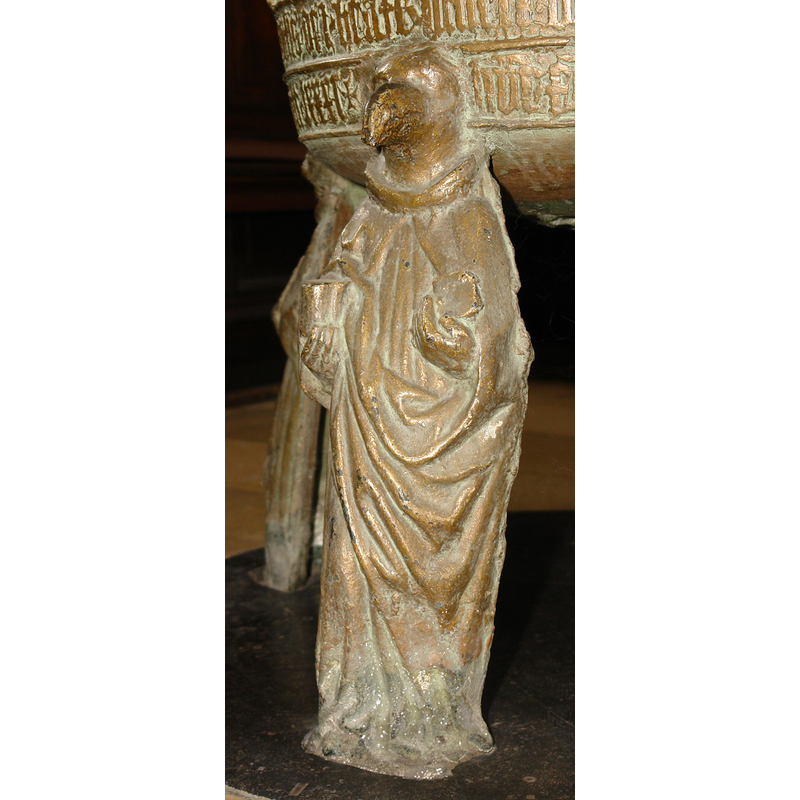 a standing cleric with an eagle's head