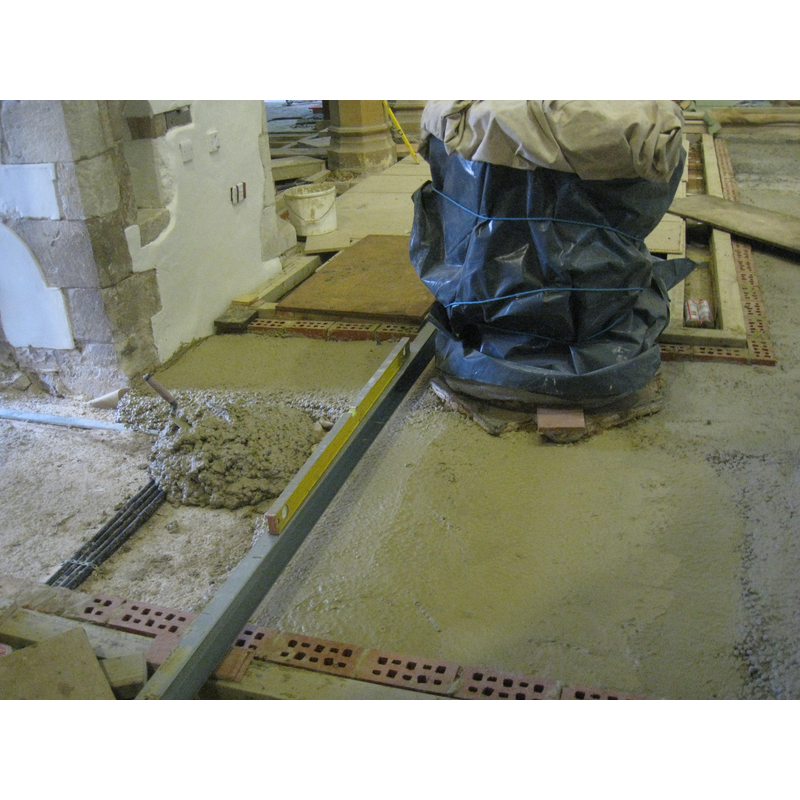 the font in the context of the 2009-2010 renovation of the church interior; photograph taken 19 January 2010