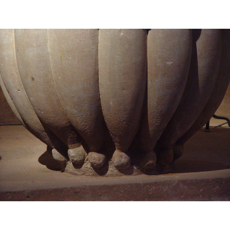 the narrow side of the ribs end in ball motif