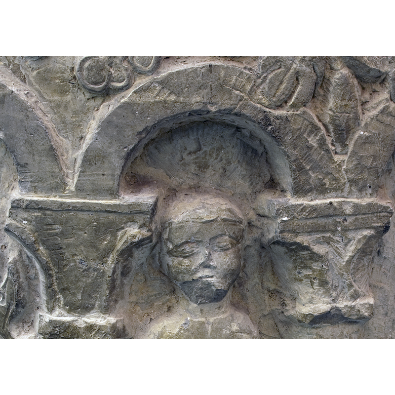the head of the child (?) or young man (?)