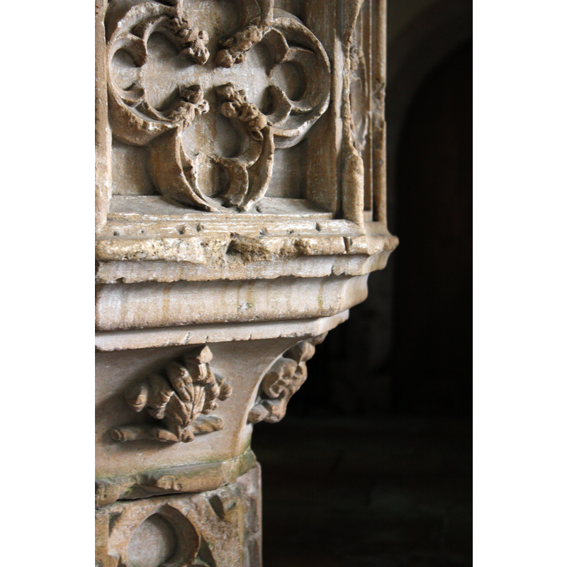 one on each panel of the underbowl; some very weathered, others re-carved?