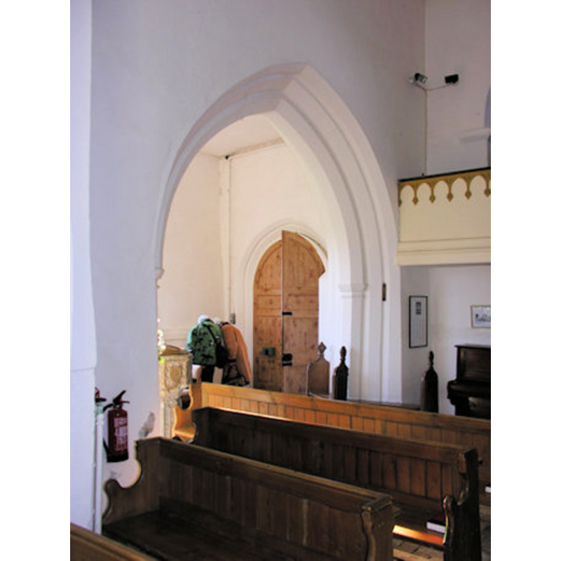 into the west end of the south aisle, where the font is located