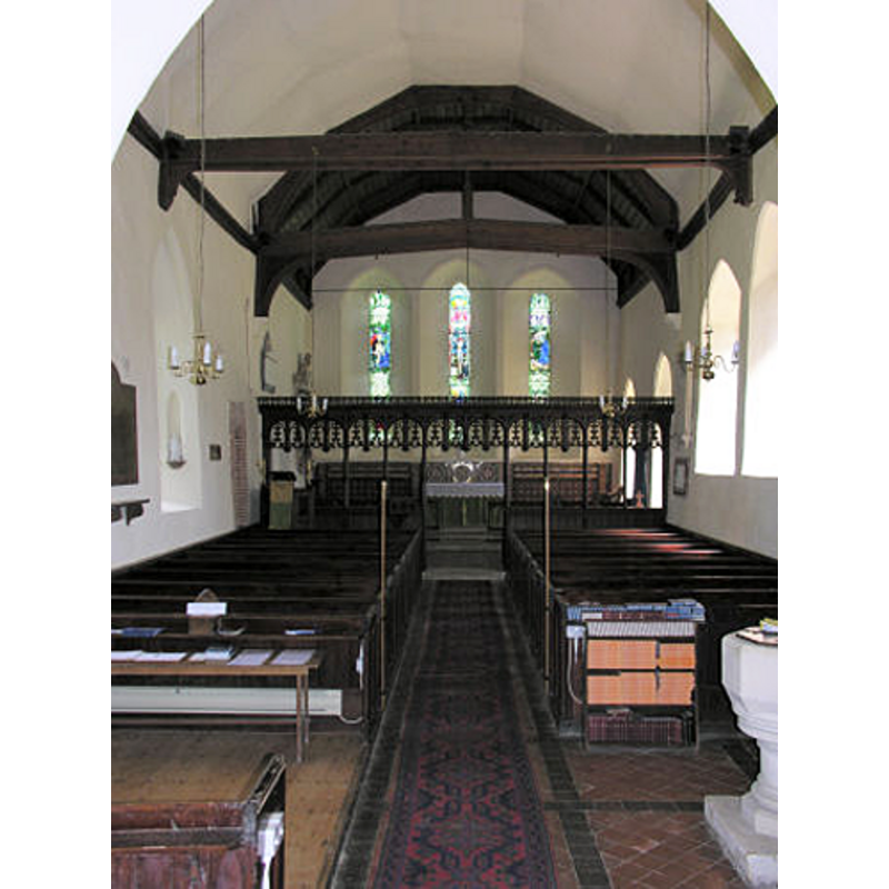 the modern font partially visible on the south (right) side