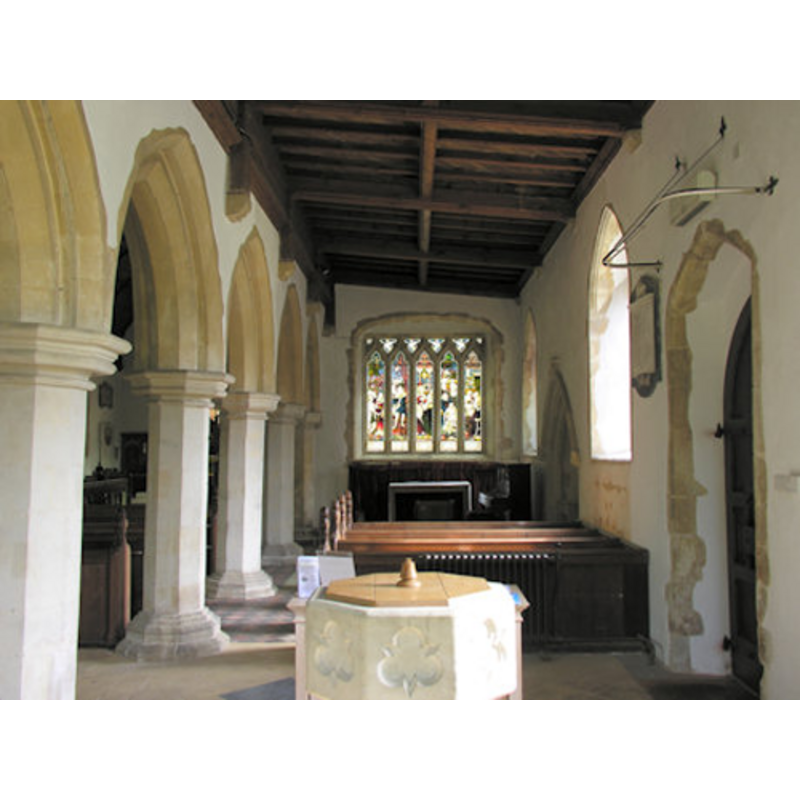 the font in the foreground (west side), just west of the south doorway