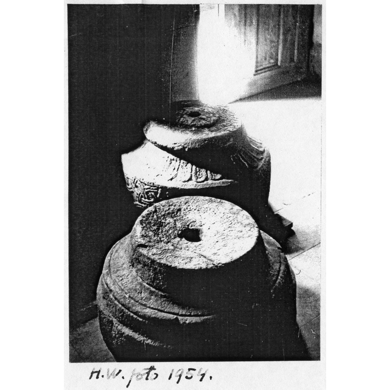 the font dismatled; ca. 1954? notice the drain holes in both the basin and base