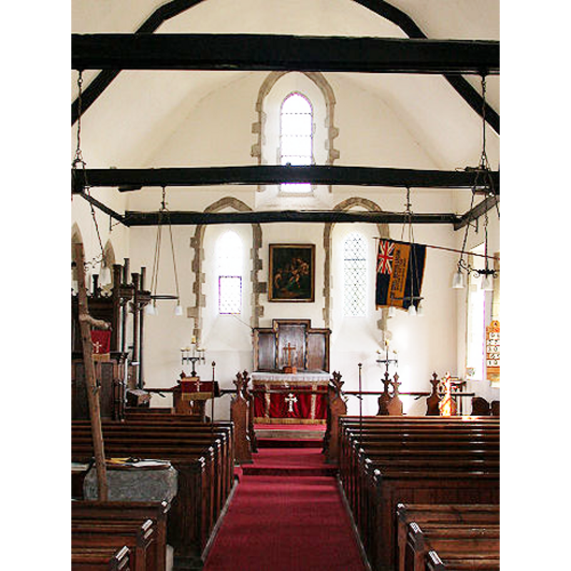 the font and cover at the west end, north (left) side of the nave