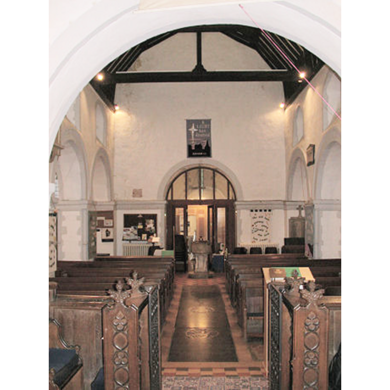 the font at the west end of the nave