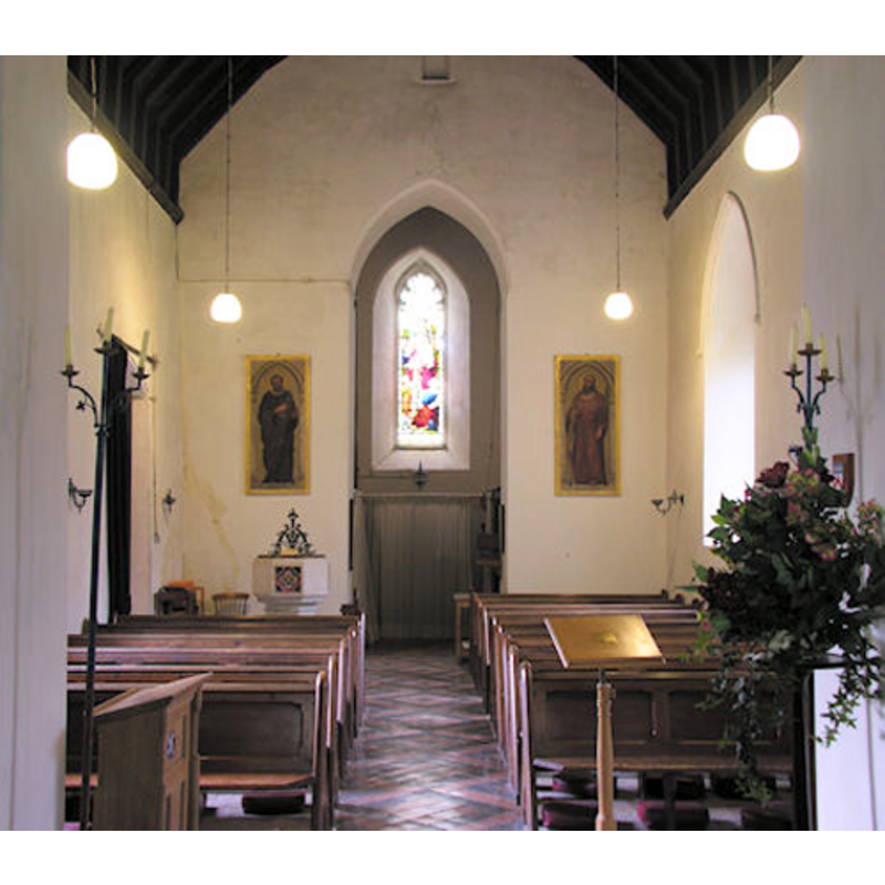 the modern font at the southwest corner of the nave