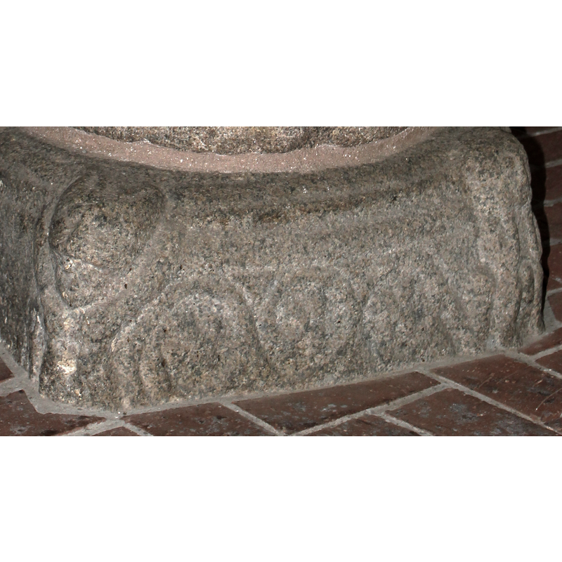 unfinished; it appears on two and and half of the lower base sides; the other one and a half sides are blank