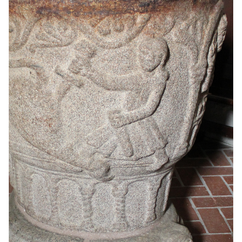 the third hunter stabs the hind quarters of the lion with the sword in his right hand, the left holding the scabbard