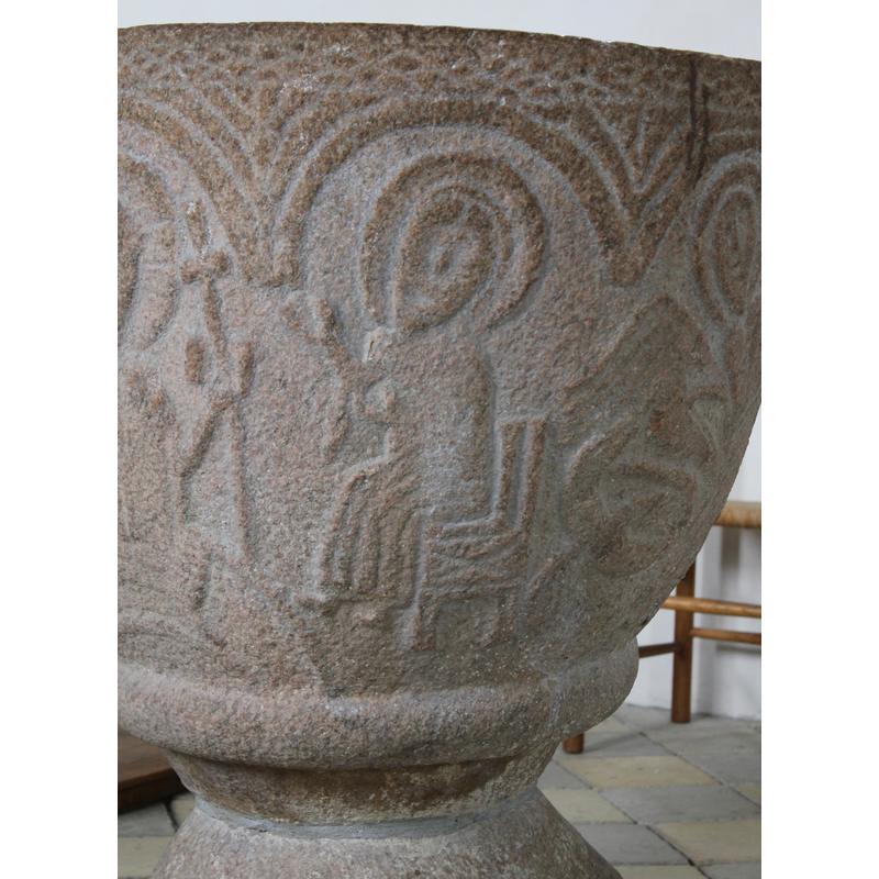seated female figure gestures towards Christ in the previous arch
