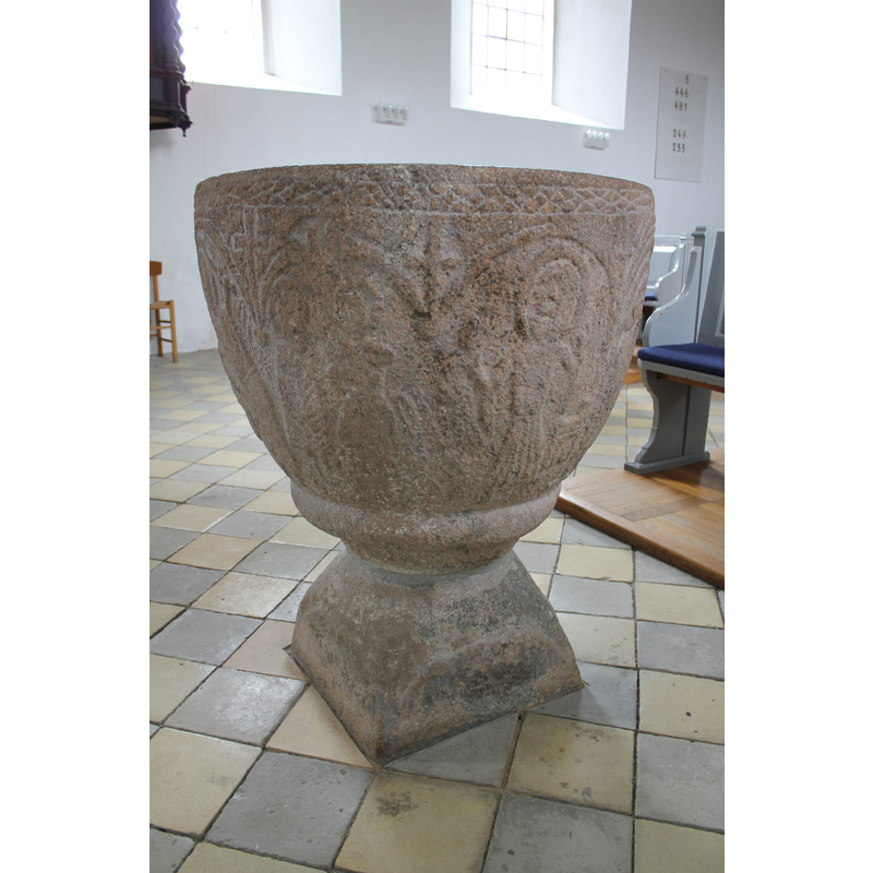 on the right, a figure in orant position; female?