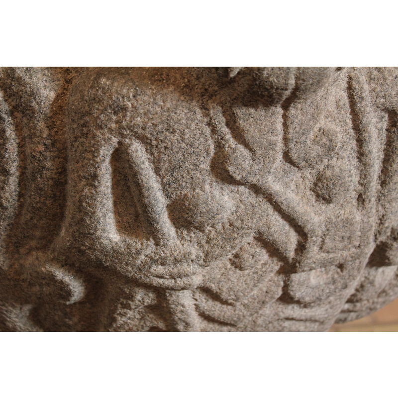 the hand hlding the staff and the pilgrim shells