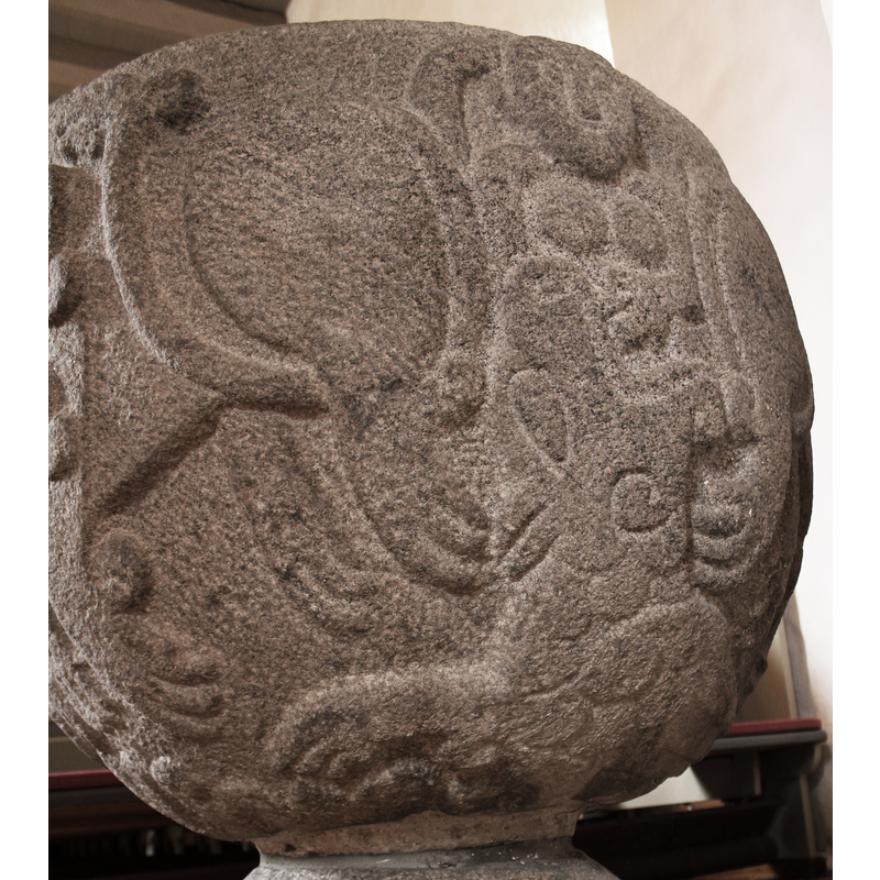 the rump and tail of one of the bi-corporal lions, and the head of the dragon swallowing the bare-breasted woman
