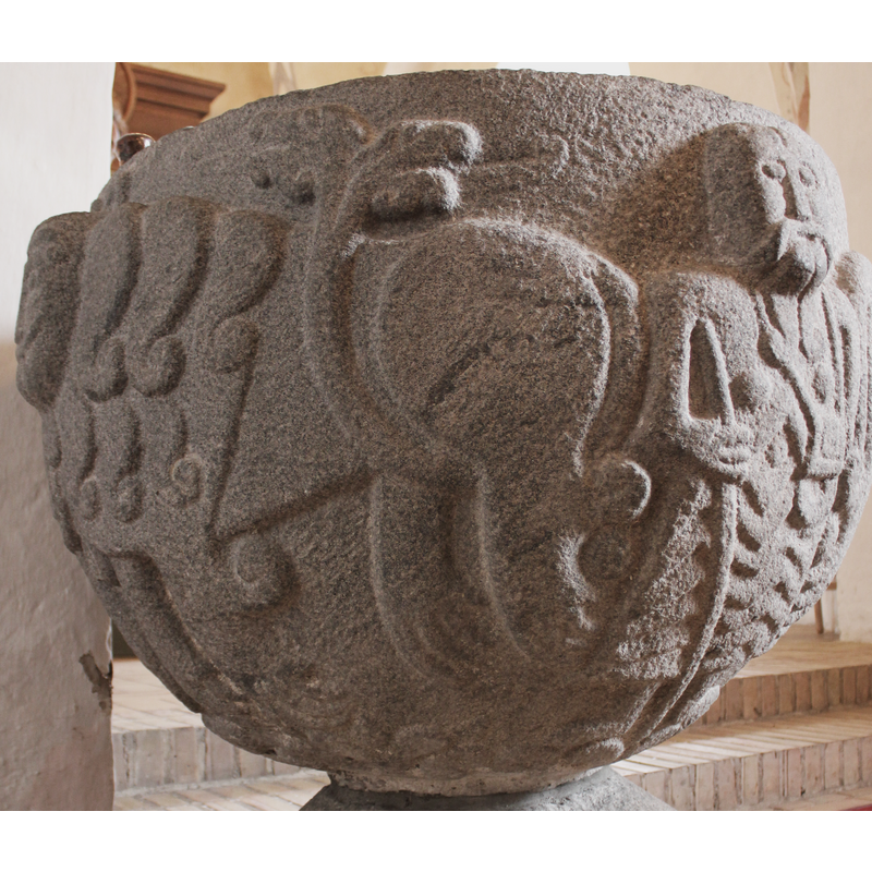 the body of one of the bi-corporal lions and the pilgrim next to it
