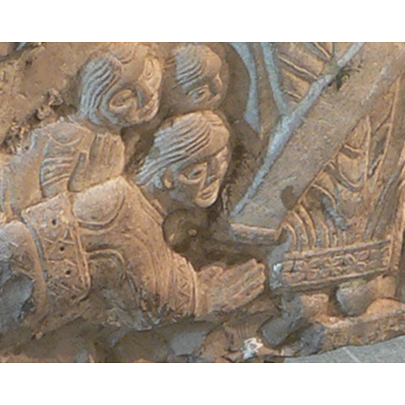 the three figures protrated at the feet of the saint; notice the rich clothing