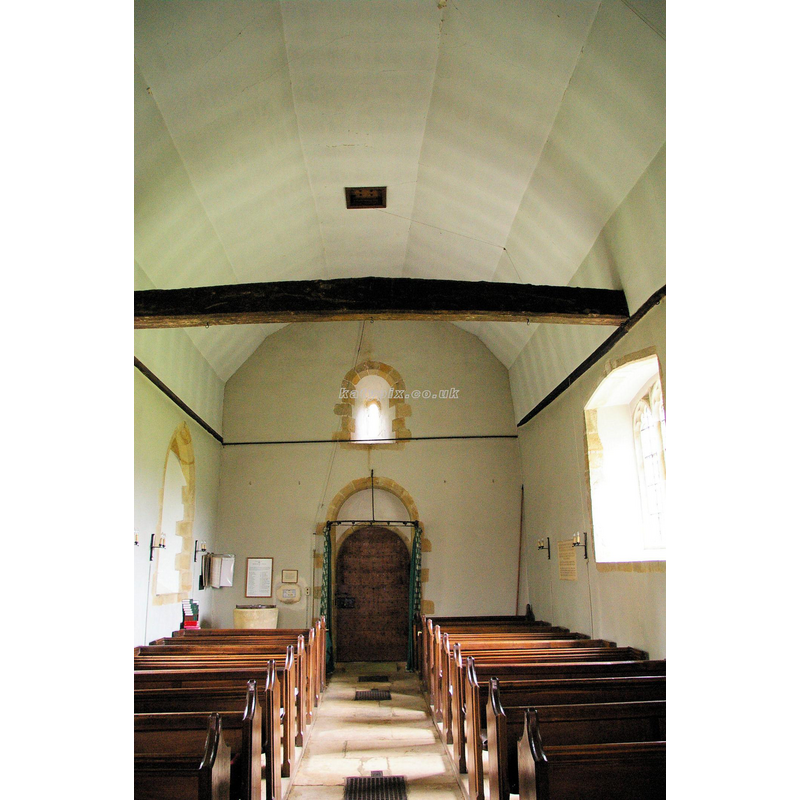 the top of the font visible at the back (west), left (south) side
