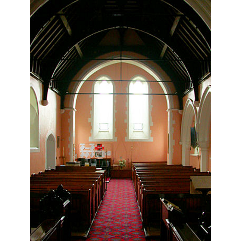 the top of the font visible at the back (west end), left (south) side