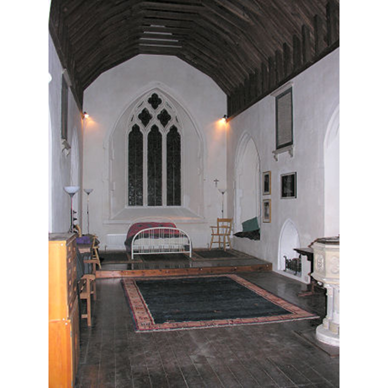 the former church, now a private residence; the former chancel, now a bedroom; the modern font still inside