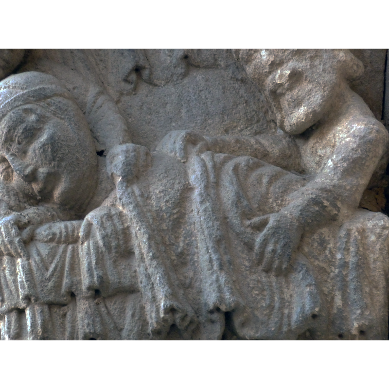 Detail of the Nativity scene: Joseph arranges the bed-cover over Mary