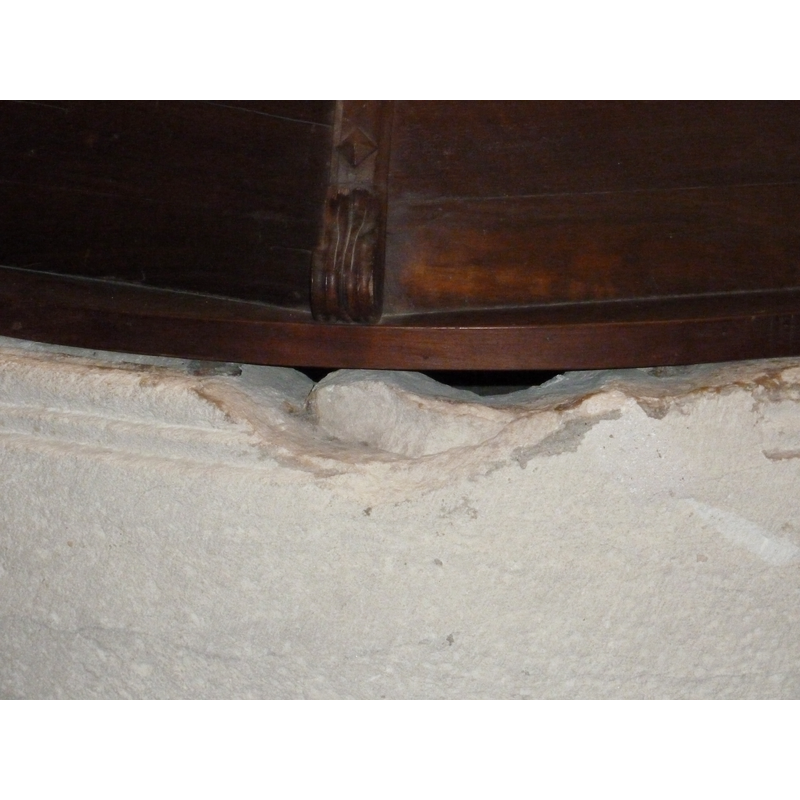 damage to the upper rim, at the back