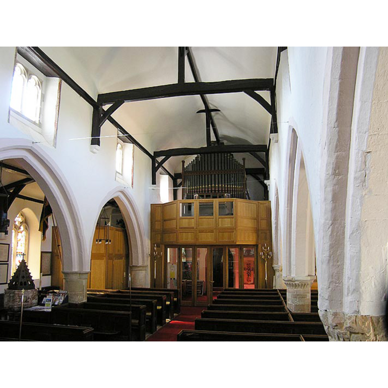 the modern font and cover by the arcade that separates the nave from the south aisle