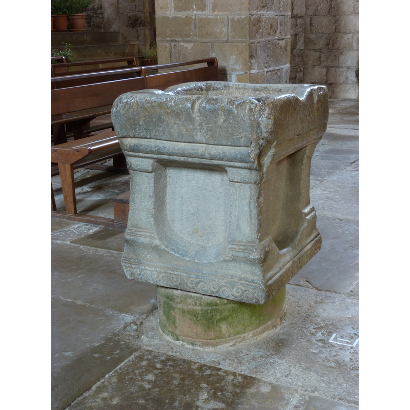 notice the incongruous base on which the stoup ia riased