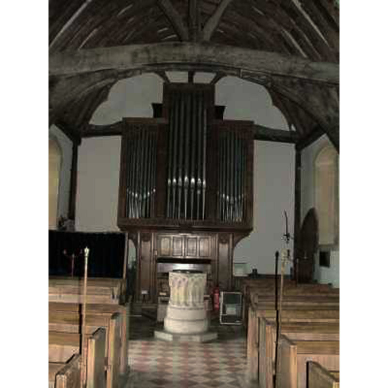 the modern font in front of the organ
