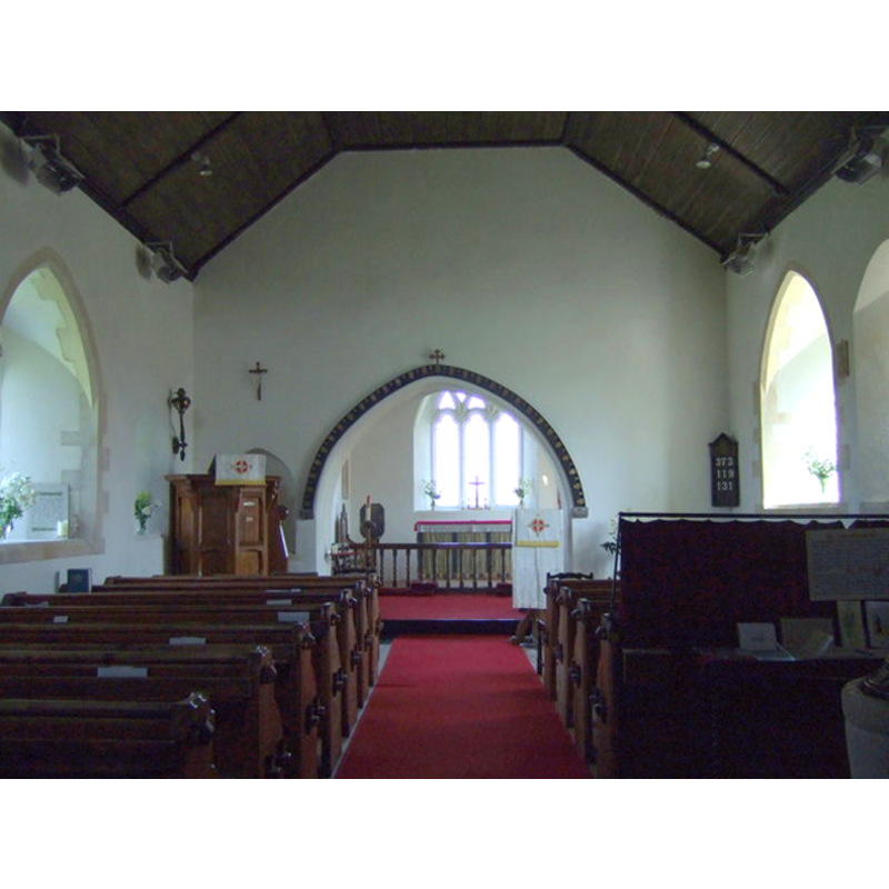 the font is partially visible at the bottom right corner of the image, that is, on the south side of the nave, by the south entranceway