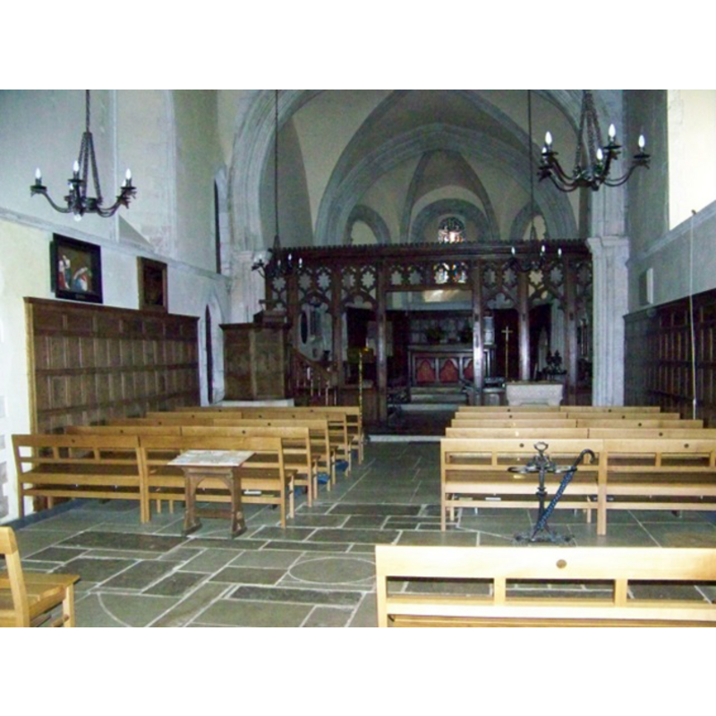 the top of the modern font is visible on the right (south) side, at the back (east), this side of the chancel screen