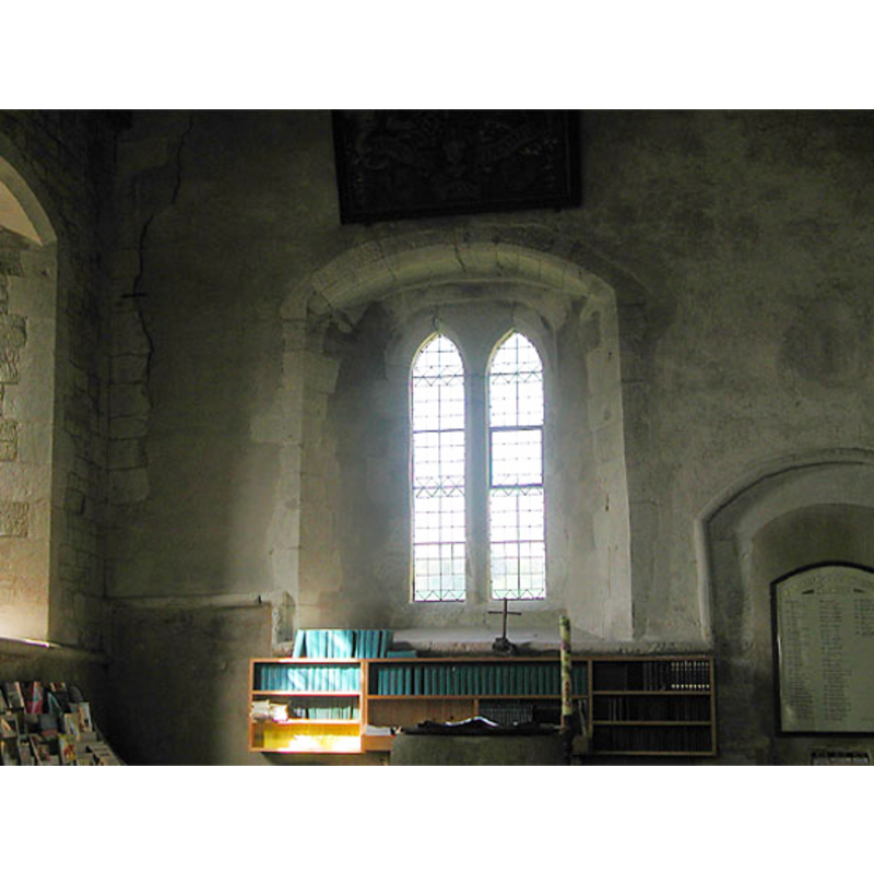the top of the font and the cover, are just visible in the foreground, centre of the image