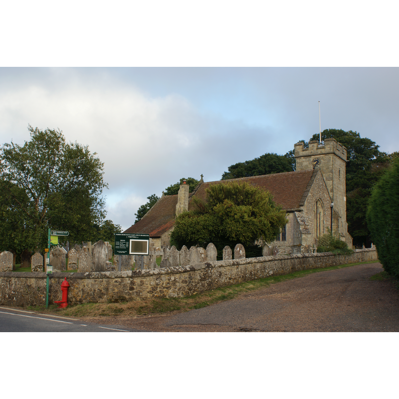 notice that the tower is built against the south side of the church