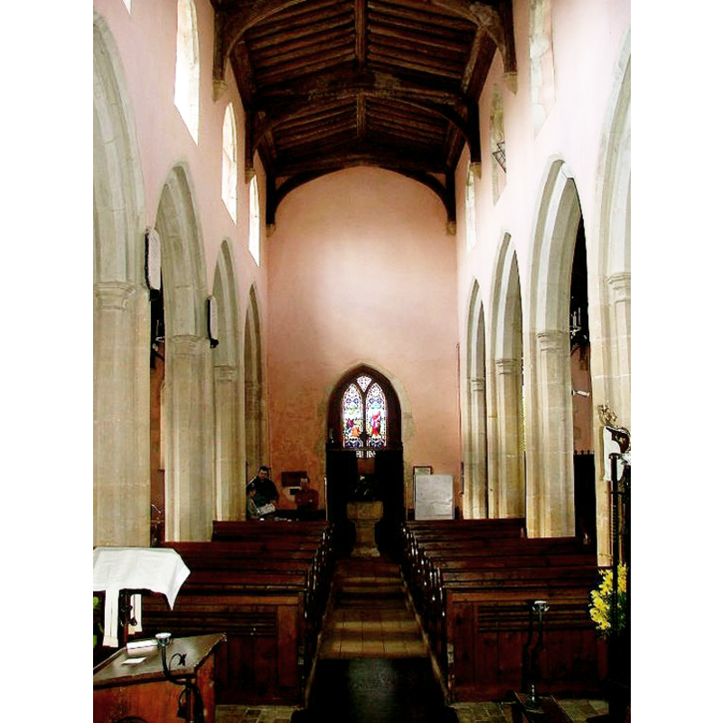 the modern font is visible at the back (west) by the tower arch