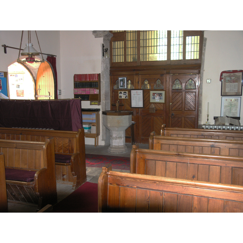 at the west end of the nave, south side
