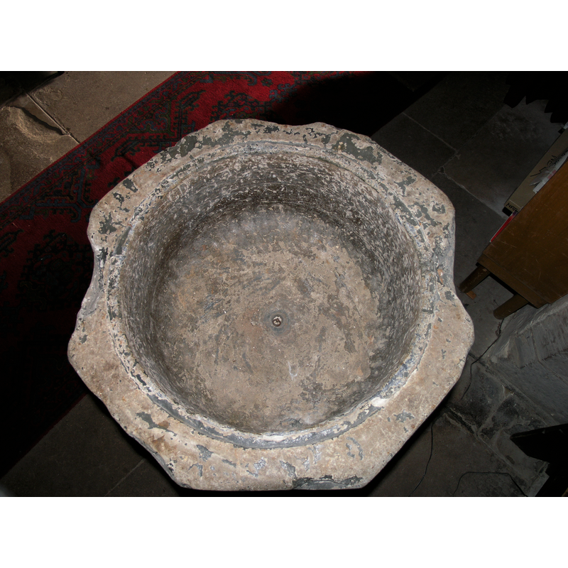 the damage to three of the sides of the octagonal basin is evident in this image