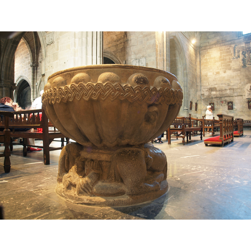 showing the two reading monks on the base, between the lions' rumps; on the basin side, between the ribs, a human figure resembling also a monk
