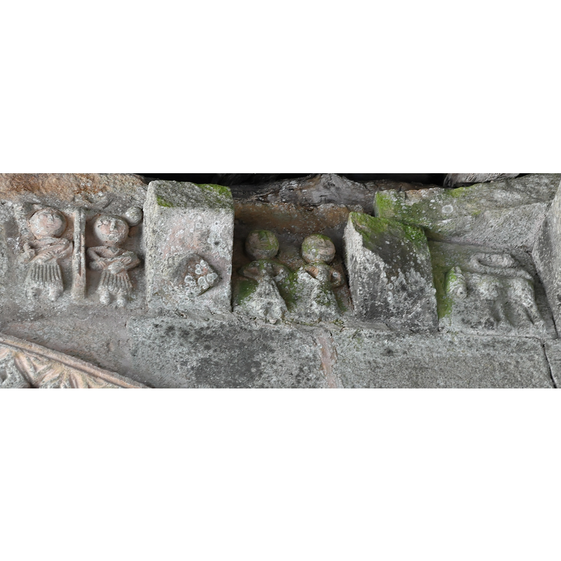 some of the carvings on the west facade, just below the modern roof