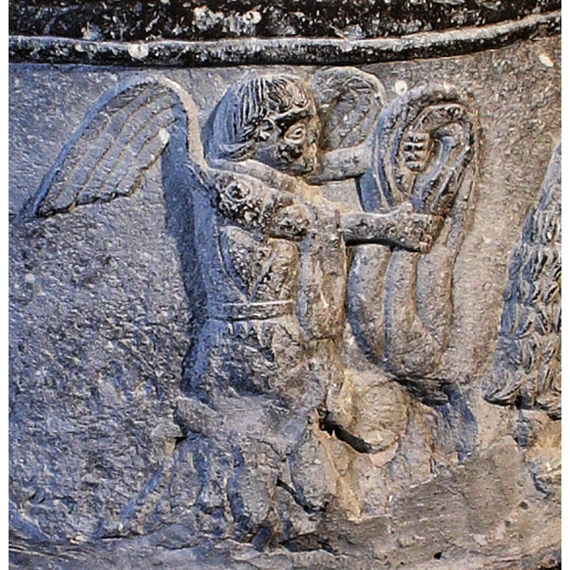 the angel holding Christ's garments, part of the Baptism scene