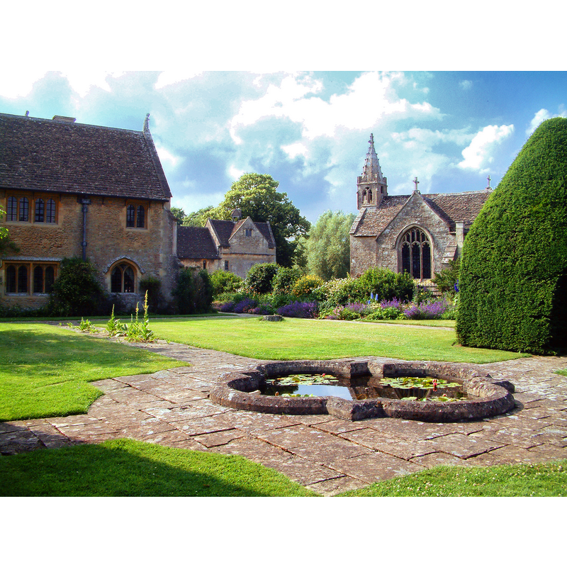 on the right, the church; on the left, the manor house