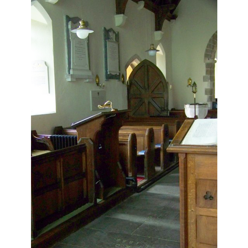 with the font and cover visible by the south entranceway