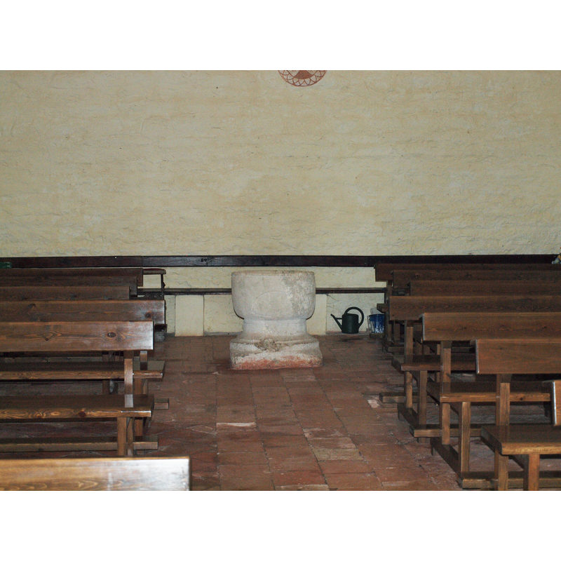 the baptismal font at the west end