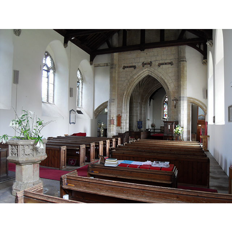 the font at the west end of the nave